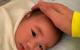 古巨基儿子正面照好可爱 古巨基老来得子太开心