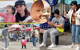 樊少皇陪妻女逛街享受家庭乐 一家三口在街头玩耍很温馨
